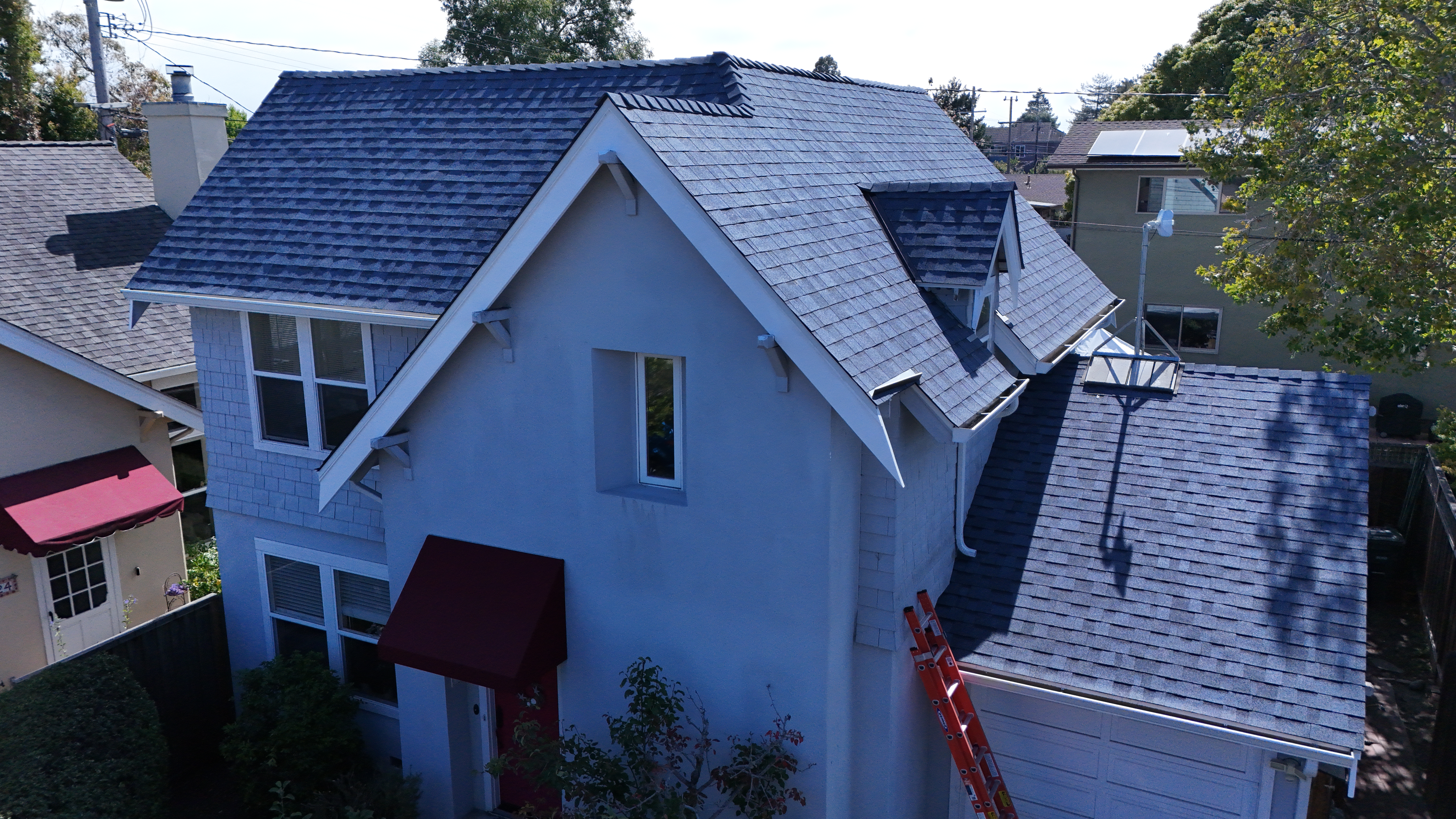 Harbor Blue shingles on gable peaks and dormer windows